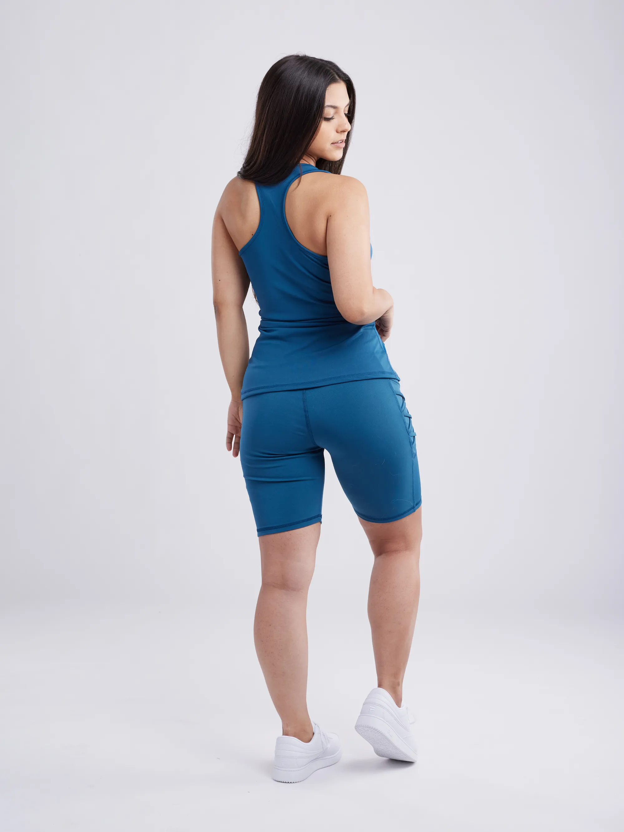 High-Waisted Mid-Thigh Workout Shorts with Pockets & Criss Cross Design