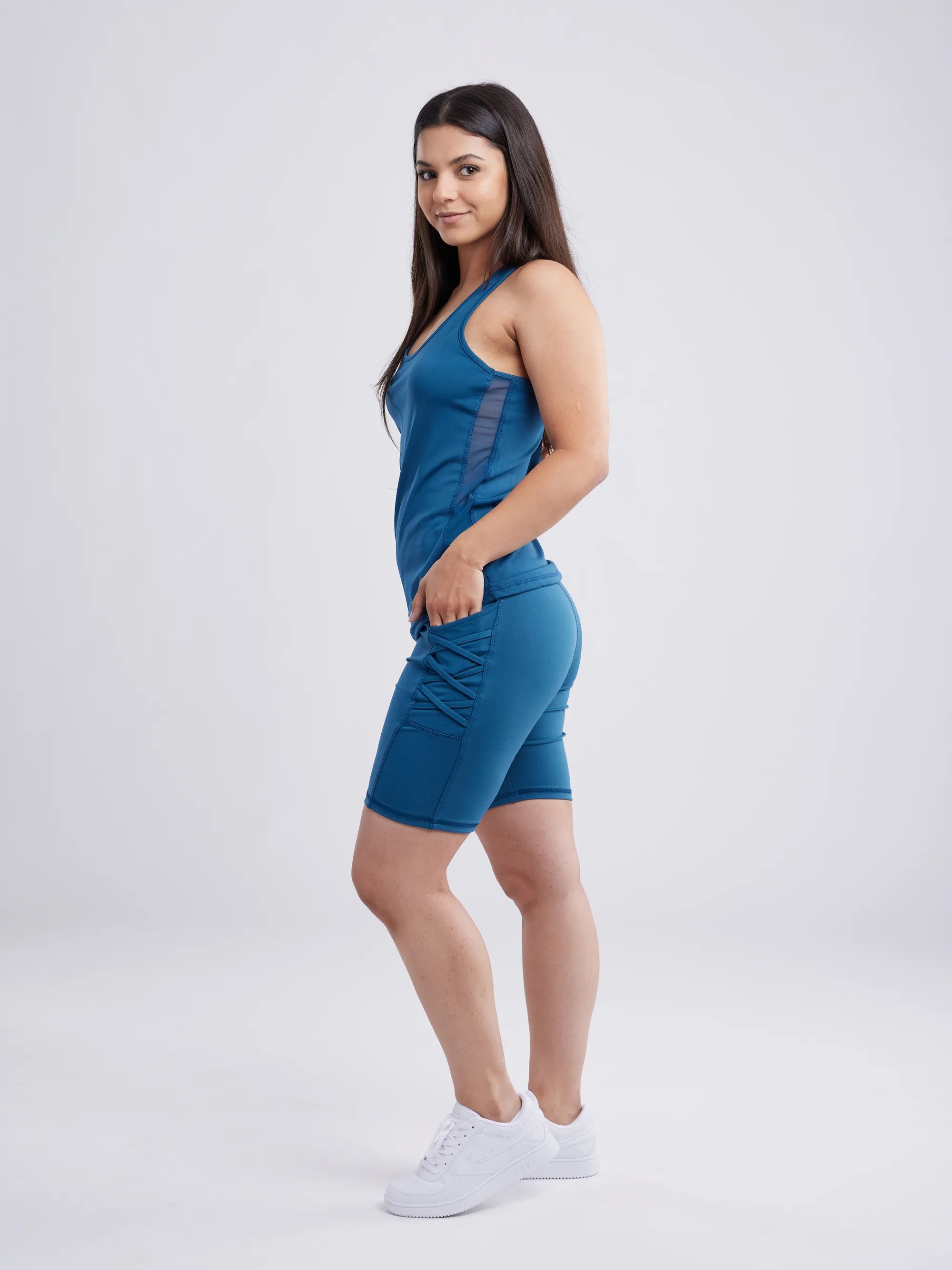 High-Waisted Mid-Thigh Workout Shorts with Pockets & Criss Cross Design