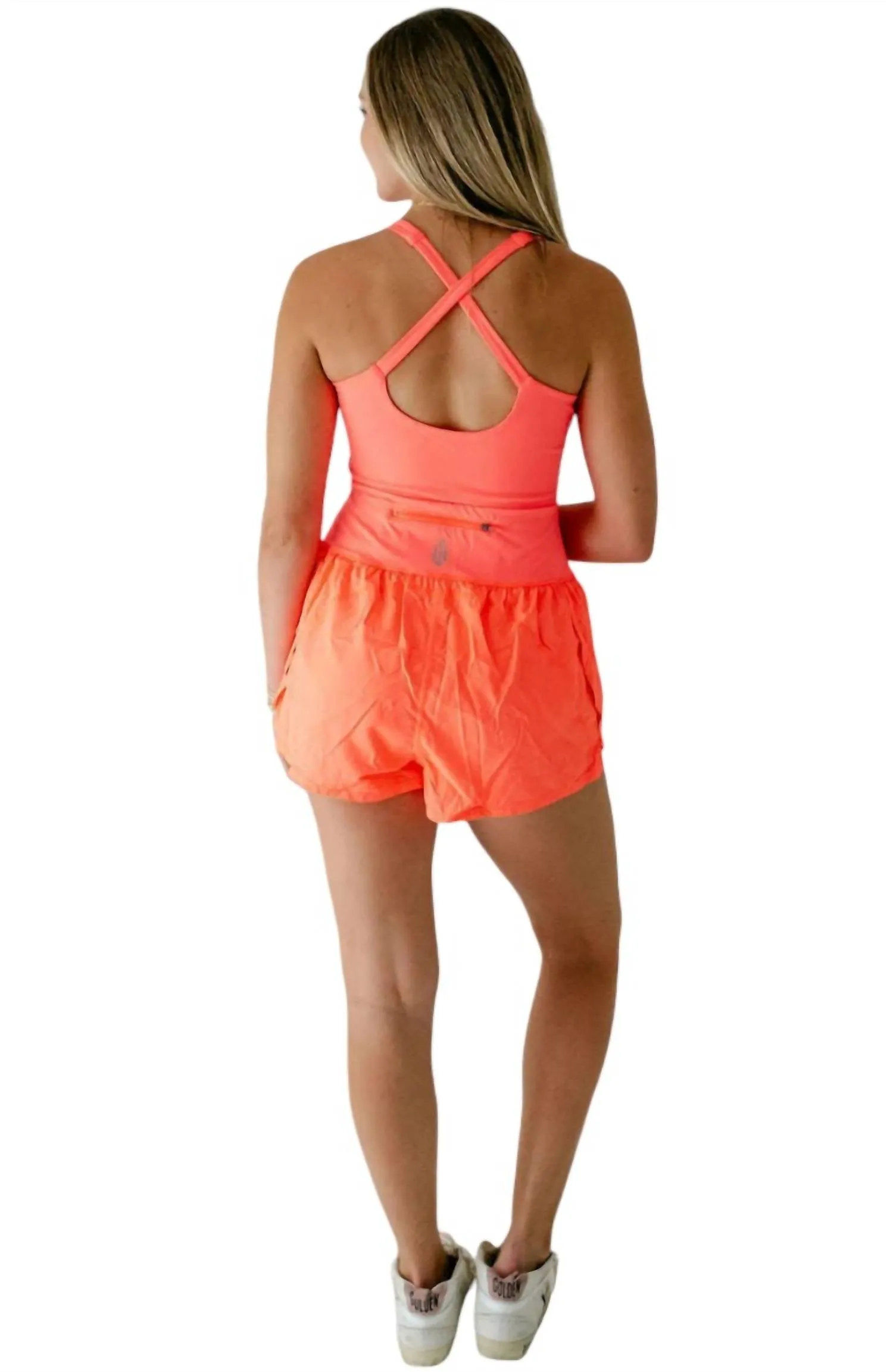 Righteous Runsie Romper In Neon Coral