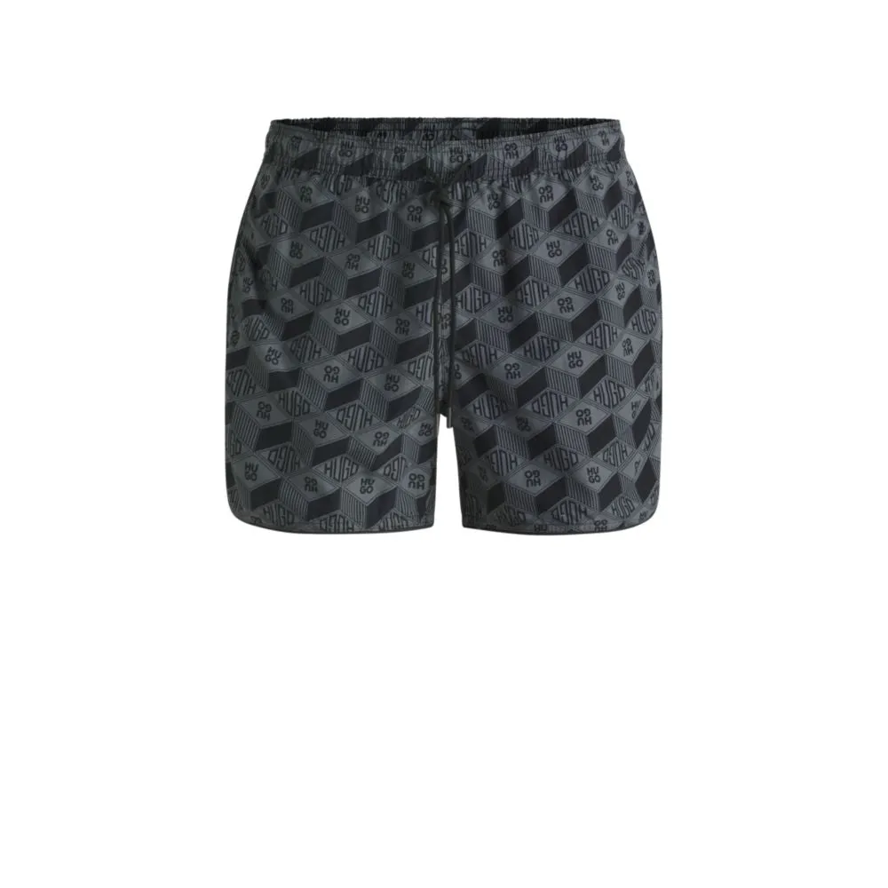Seasonal-print swim shorts with round hem