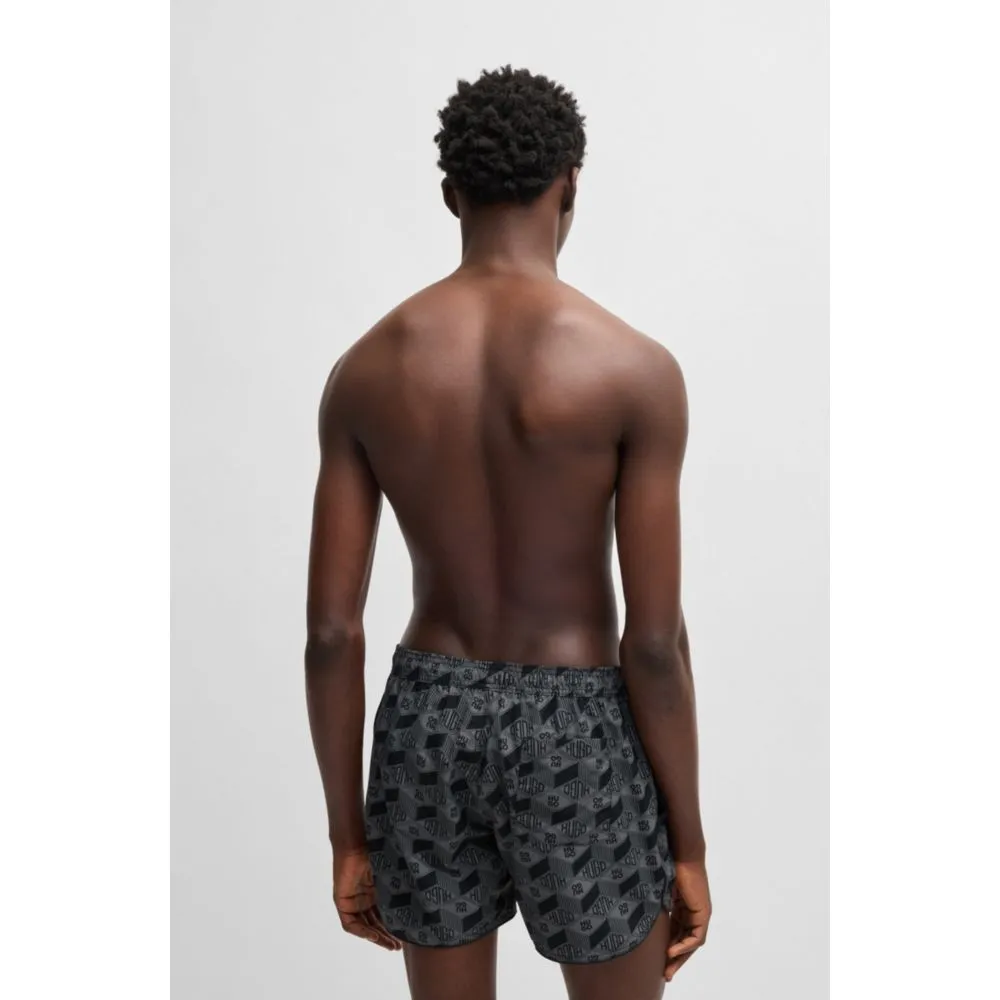 Seasonal-print swim shorts with round hem