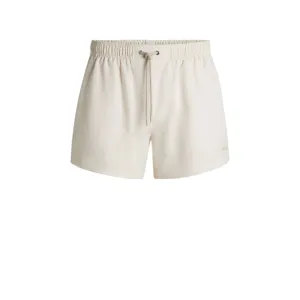 Swim shorts in striped seersucker fabric