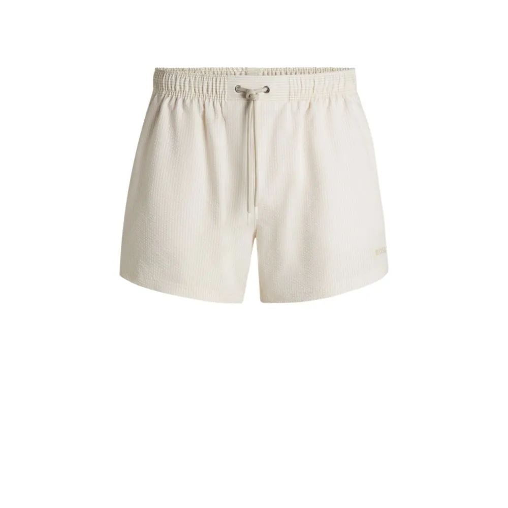 Swim shorts in striped seersucker fabric